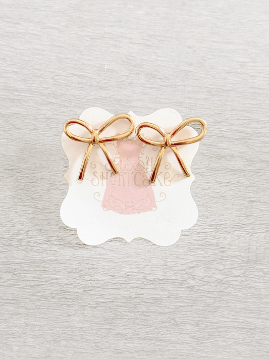 Gold Classic Bow earrings: elegant gold bow-shaped earrings for women.
