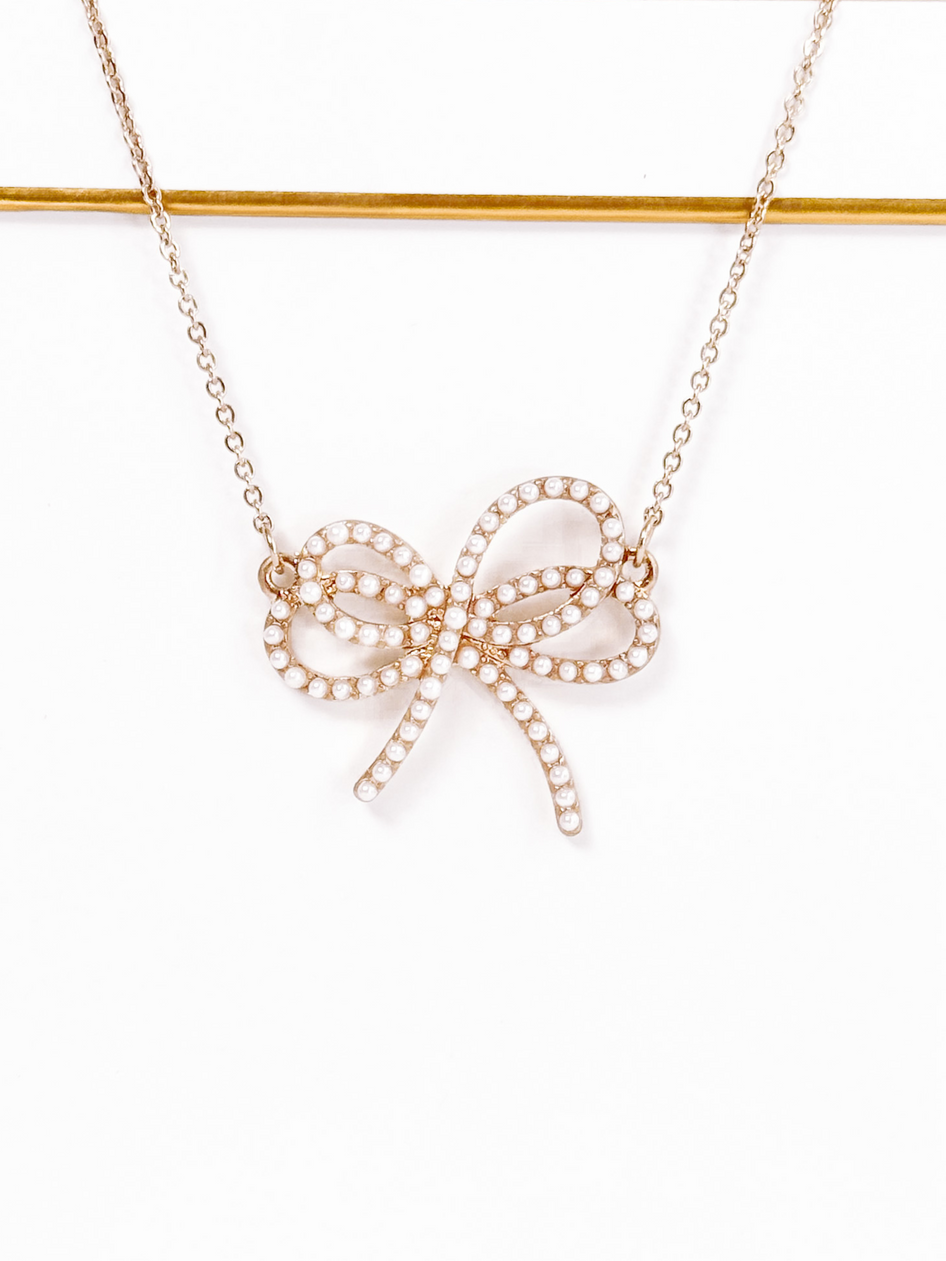 Gold Double Bow Necklace with Pearl Accents
