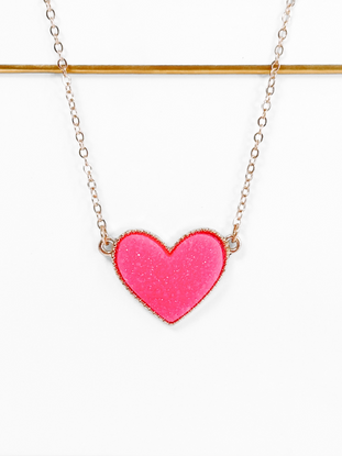 Big Pink Love Heart Necklace: Sparkling pink heart pendant on rose gold chain
