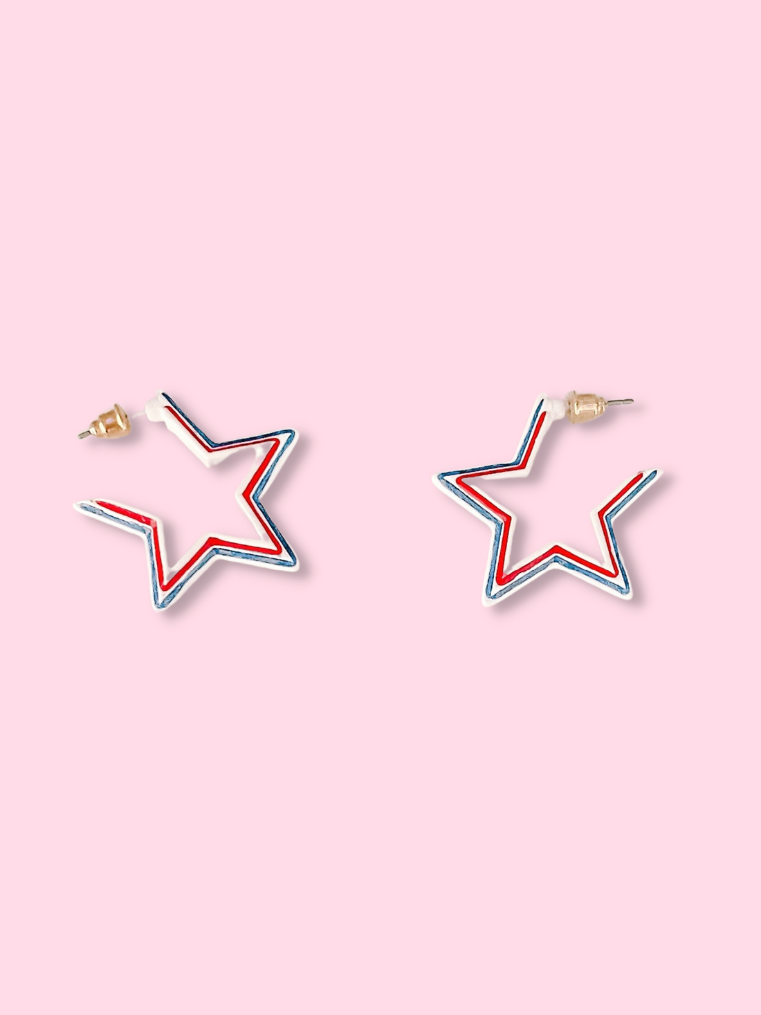 Red, white, and blue star-shaped hoop earrings.
