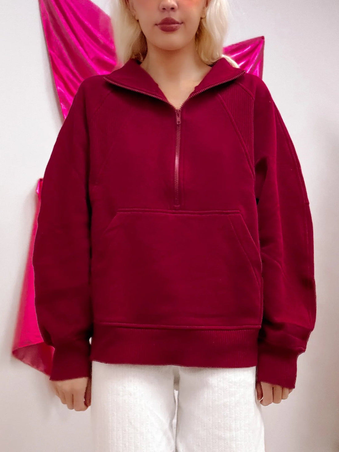 model wearing a burgundy pullover from sassy shortcake