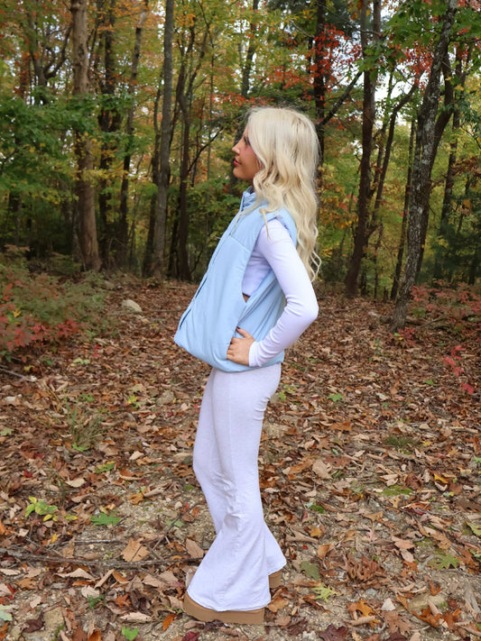 Alpine Air Vest - Sassy Shortcake - side view of light blue vest outdoor fall layering outfit