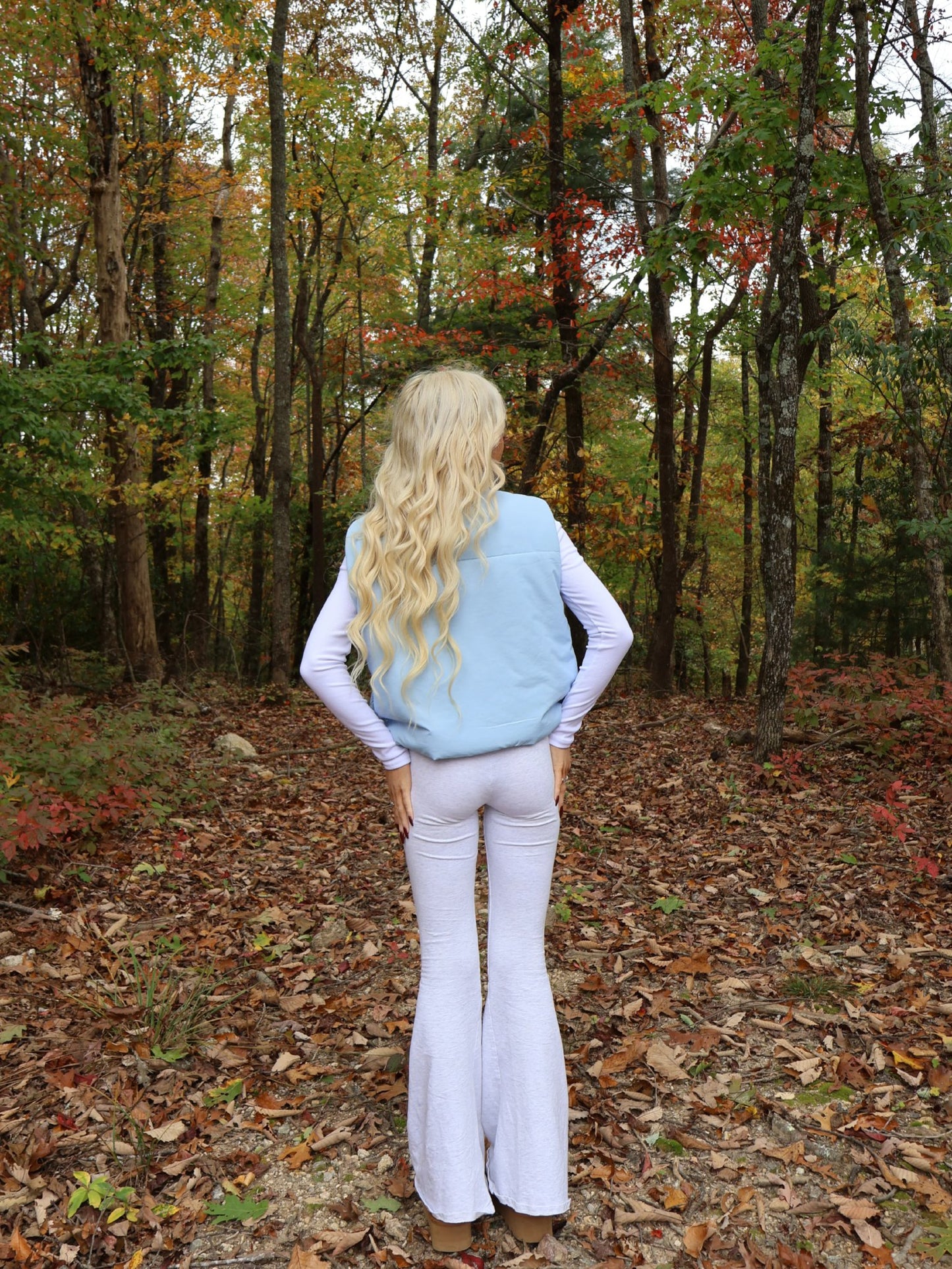 Alpine Air Vest - Sassy Shortcake - back view of light blue vest outdoor fall outfit