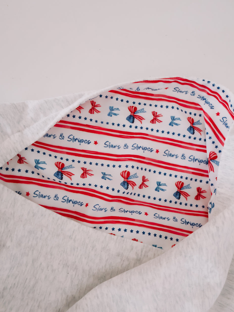 Close-up of inner hood lining on patriotic grey hoodie.