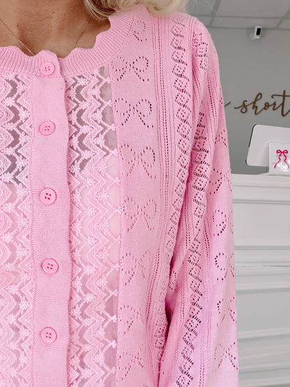 Bisous Bow Pink Cardigan by Sassy Shortcake – pink pointelle bow knit cropped cardigan front view
