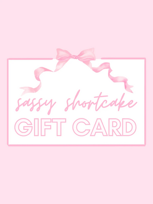 Sassy Shortcake Gift Card featuring a pink ribbon bow
