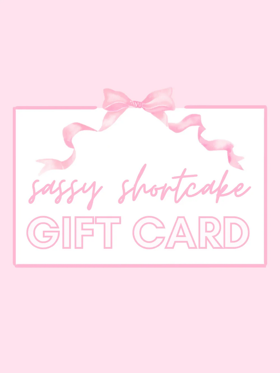 Sassy Shortcake Gift Card featuring a pink ribbon bow
