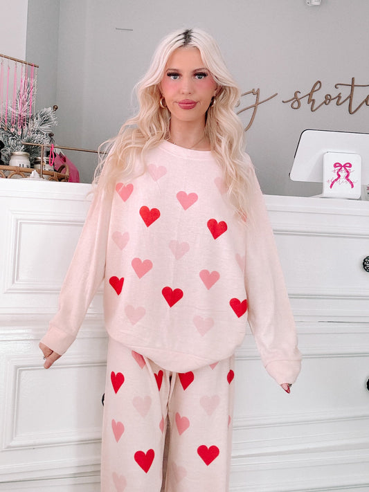 Hearts All Over PJ Set from Sassy Shortcake – front view of pink and red heart print pajama set with relaxed fit top and pants