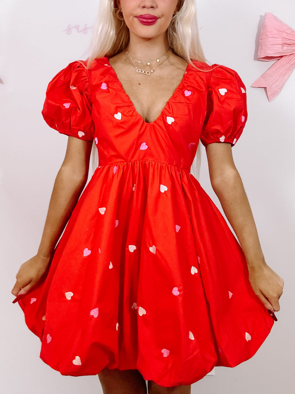 Red Mark My Love dress with pink and red heart accents.
