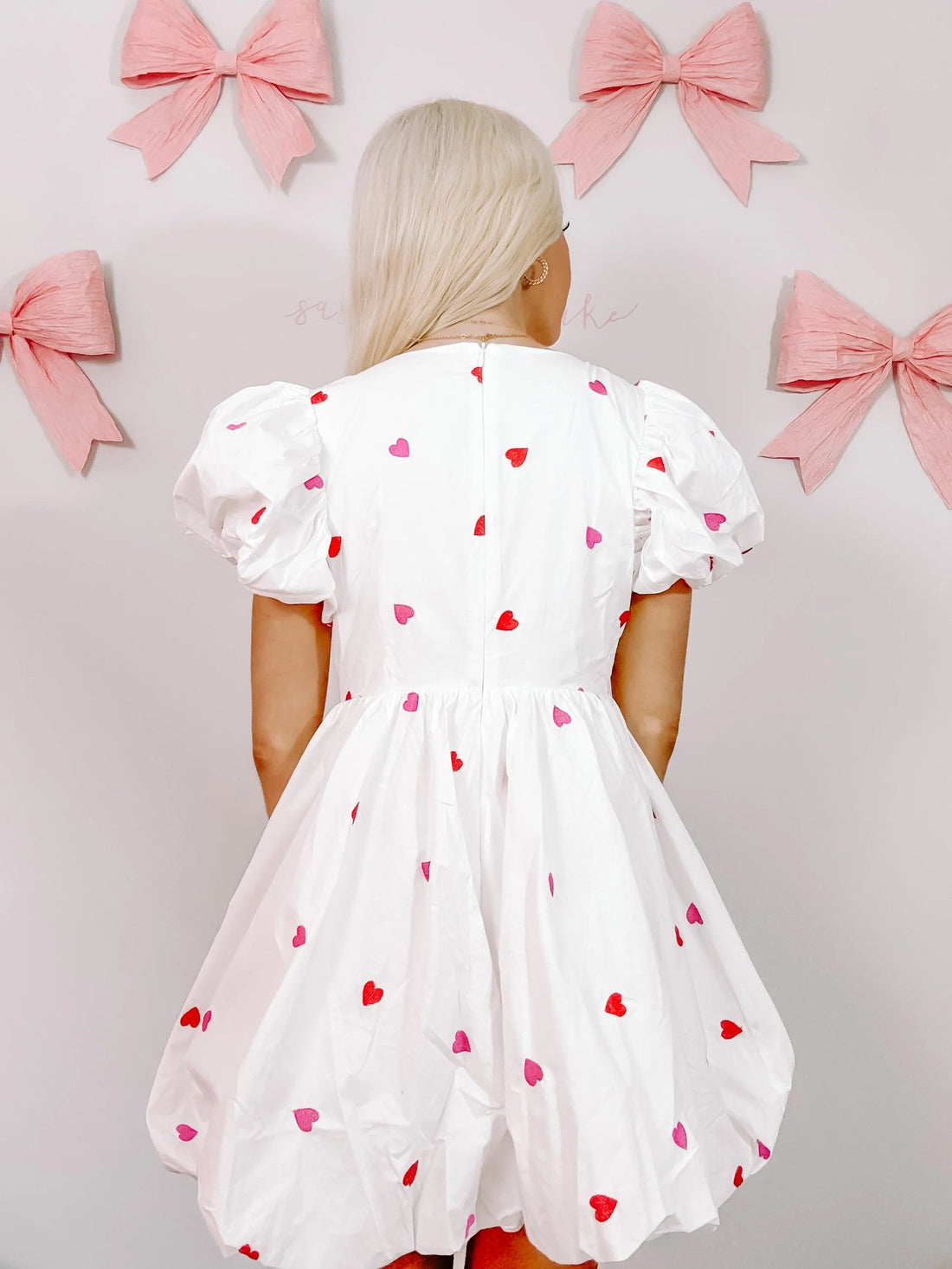 Marked My Love Dress in White by Sassy Shortcake, back view of white heart bubble dress, flattering fit detail