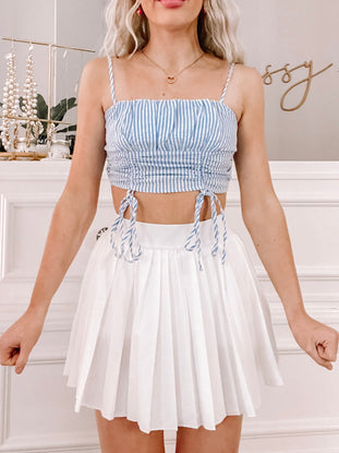 Blue and white striped Lucy Lou crop top with drawstring waist.
