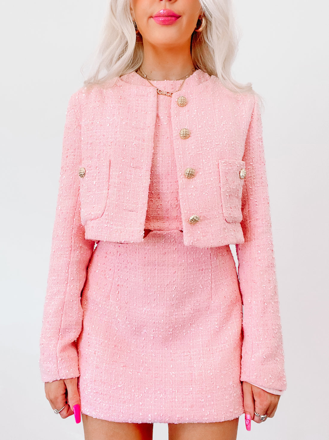 Pink tweed Boss Barbie set; cropped jacket & mini skirt with gold buttons.
