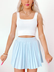 Baby blue pleated tennis skirt; stylish and comfortable.
