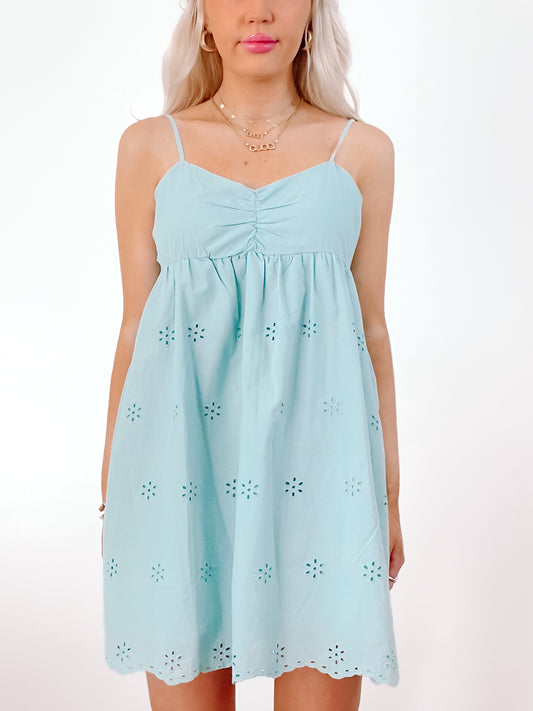 Lemonade Breeze Dress in teal blue eyelet cotton; summery, casual fit.
