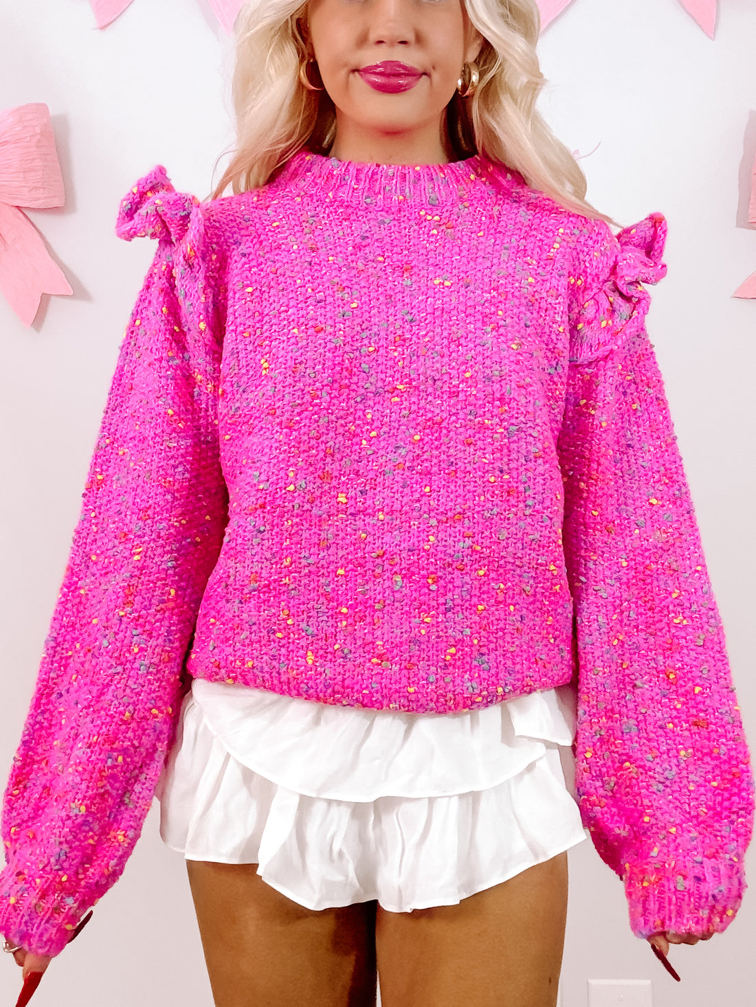 Pink Rainbow Sprinkles knit sweater with ruffle details
