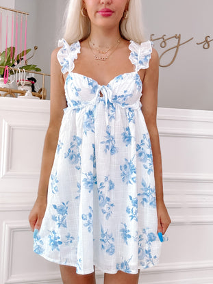 Nantucket floral mini dress: blue & white rose print, ruffle straps
