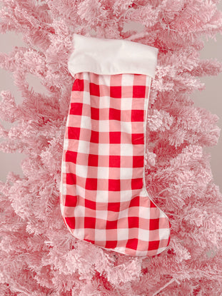 Red and pink gingham Christmas stocking with white cuff
