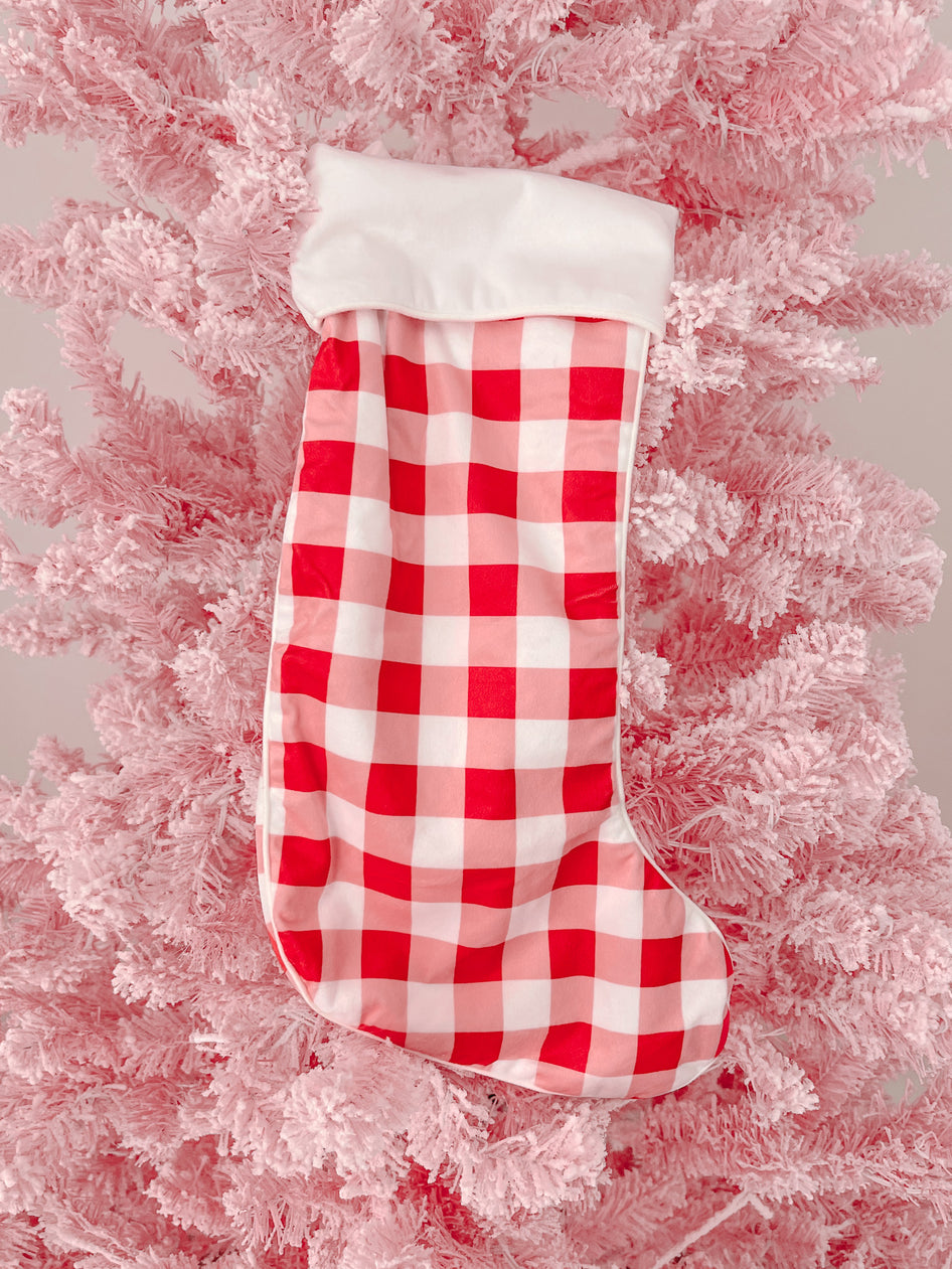 Red and pink gingham Christmas stocking with white cuff

