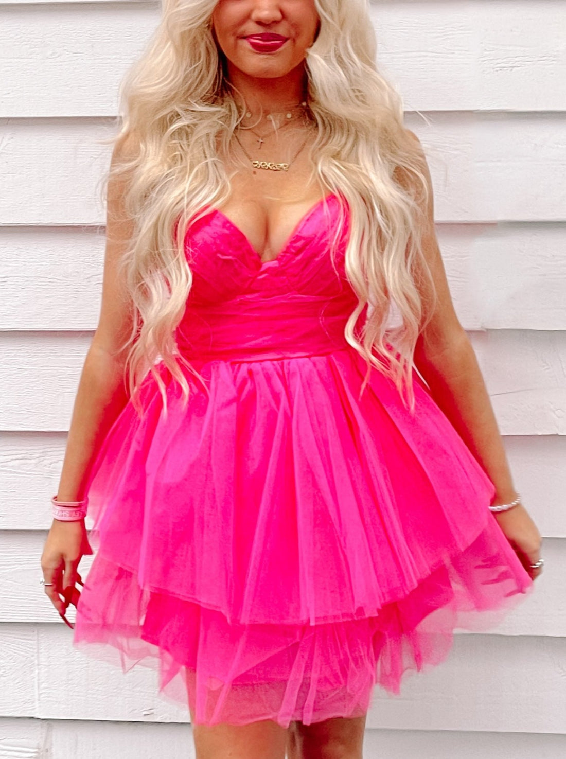 Hot pink tulle mini dress; layered skirt, sweetheart neckline.
