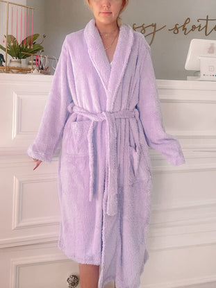 Lilac fuzzy robe, ultra-soft and cozy for ultimate relaxation.
