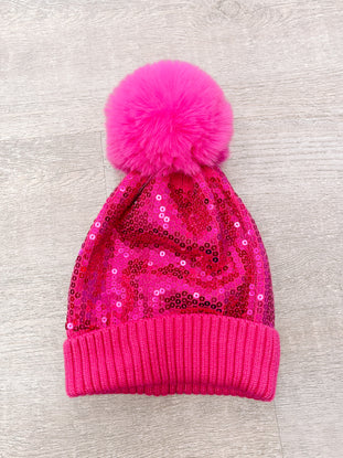 Hot pink sequin beanie with fluffy pompom
