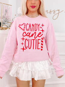 Pink Candy Cane Cutie crewneck sweatshirt with red candy cane and sparkle graphic
