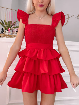 Red Sweet Sorbet tiered mini dress with ruffle sleeves.
