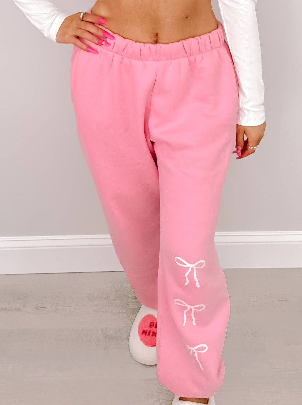 Pink Blushing Bow Sassy Sweatpants with cute bow details.
