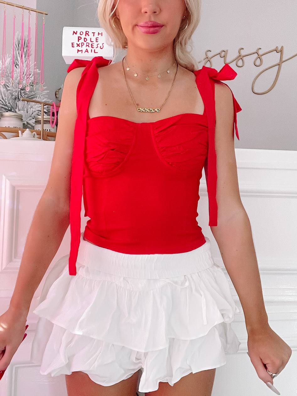Red Mavri top with tie straps; stylish women's summer top.
