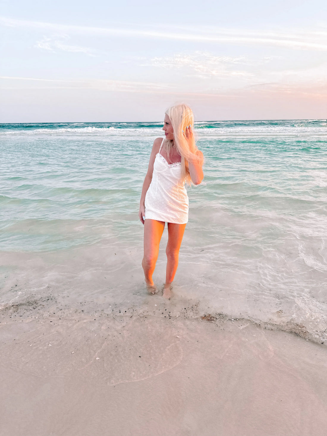 Short White flower girl dress on beach with eyelet fabric 
