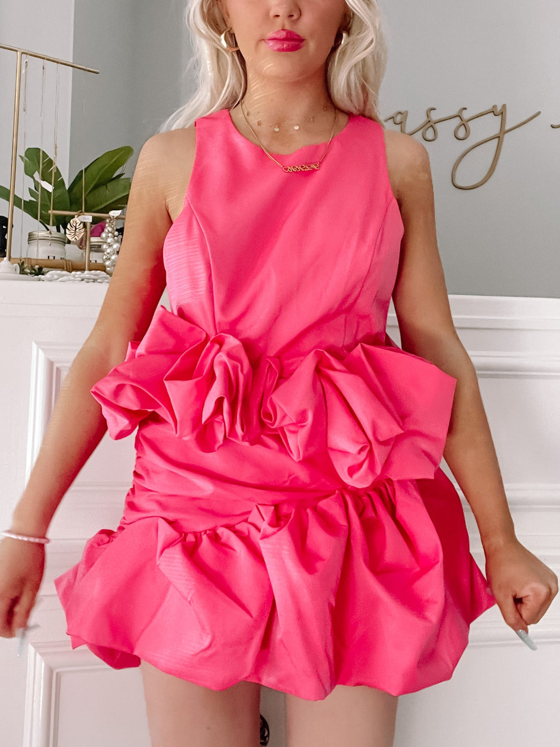 Model wearing Sassy Shortcake On Cloud Nine pink two-piece ruffle outfit with statement layered skirt
