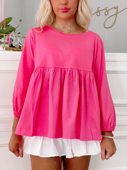 Hot pink Get Busy Top with white layered bottom;  bubble sleeves, relaxed fit.
