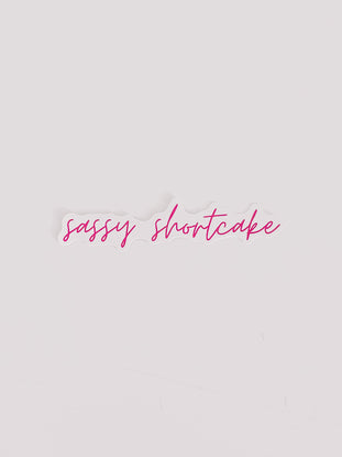 Pink "Sassy Shortcake" sticker on a white background.
