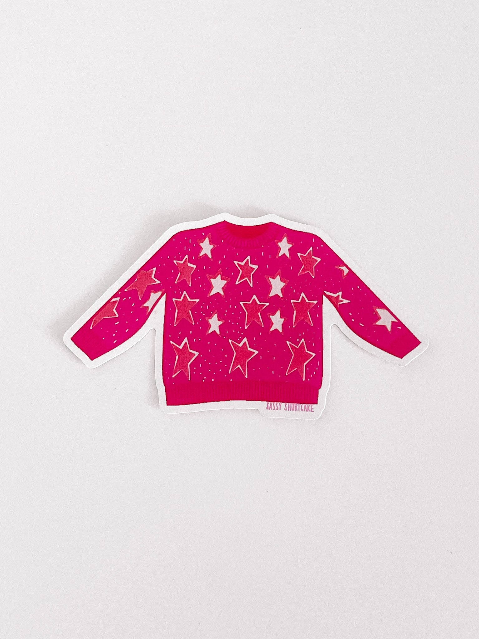 Pink star sweater sticker on white background
