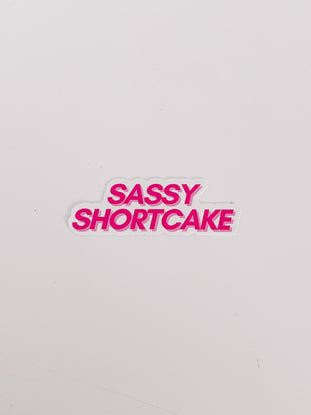 Pink "Sassy Shortcake" sticker on white background.
