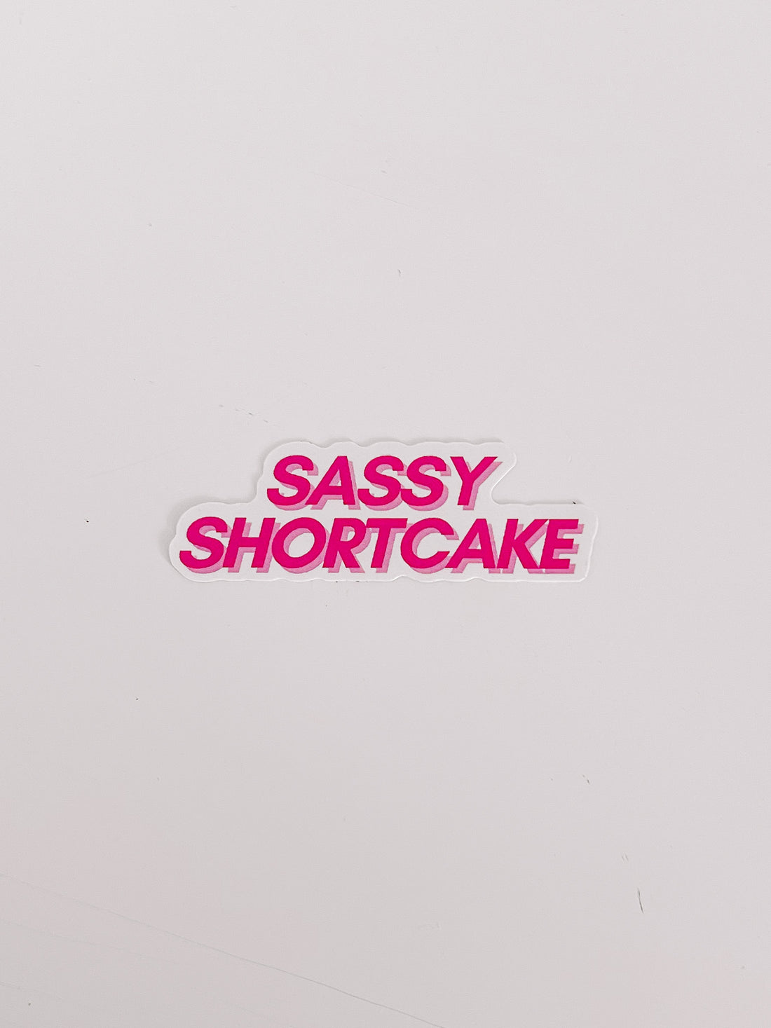 Pink "Sassy Shortcake" sticker on white background.
