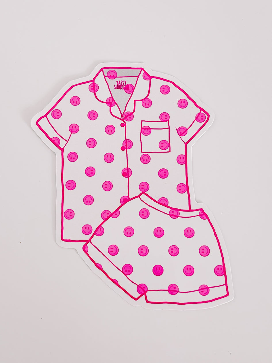 Pink smiley face pajama sticker sheet; fun, playful design.
