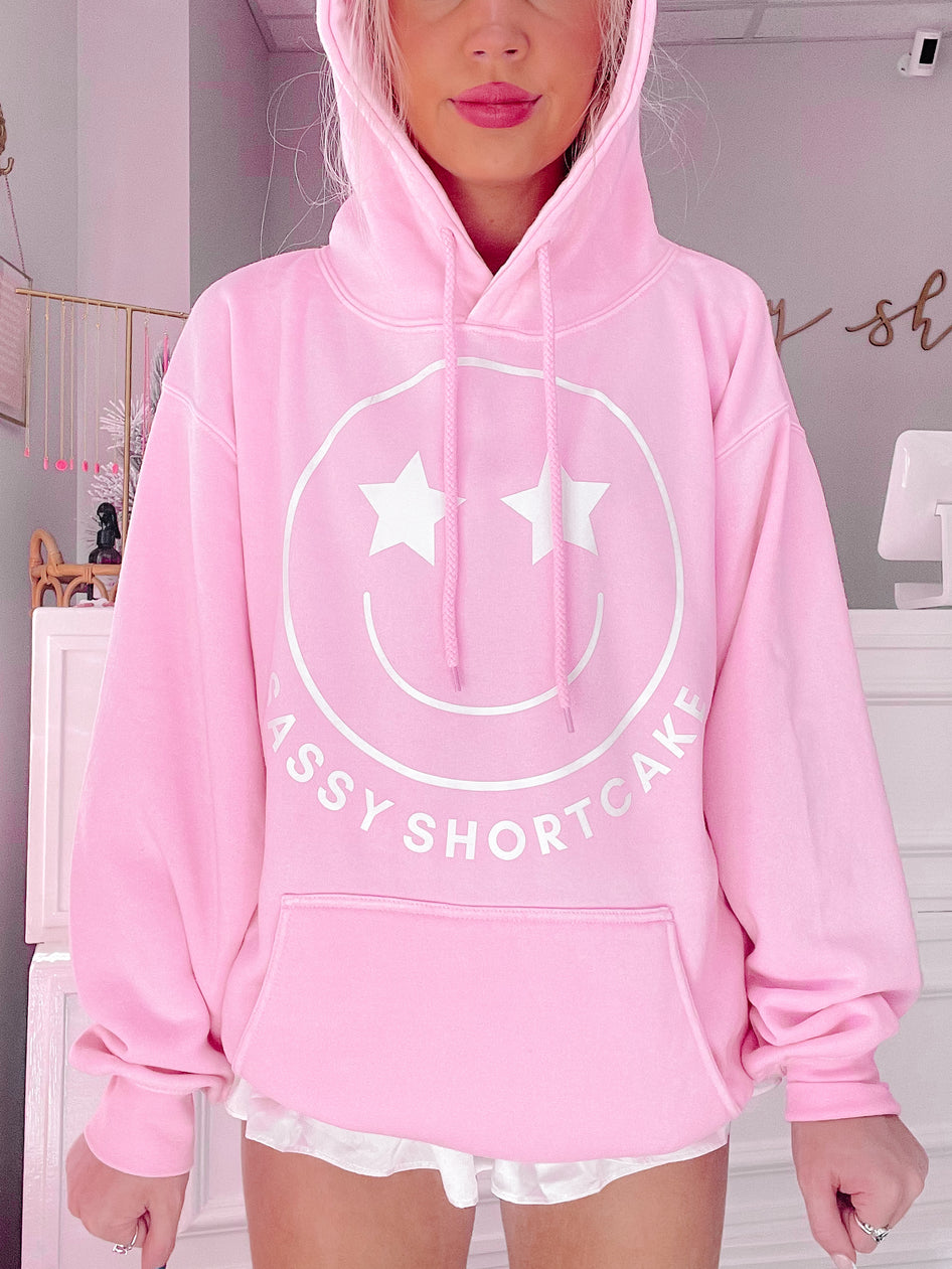 Pink Sassy Shortcake Smiley hoodie with star eyes
