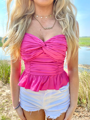Pink Taffy Twist top with ruffle hem

