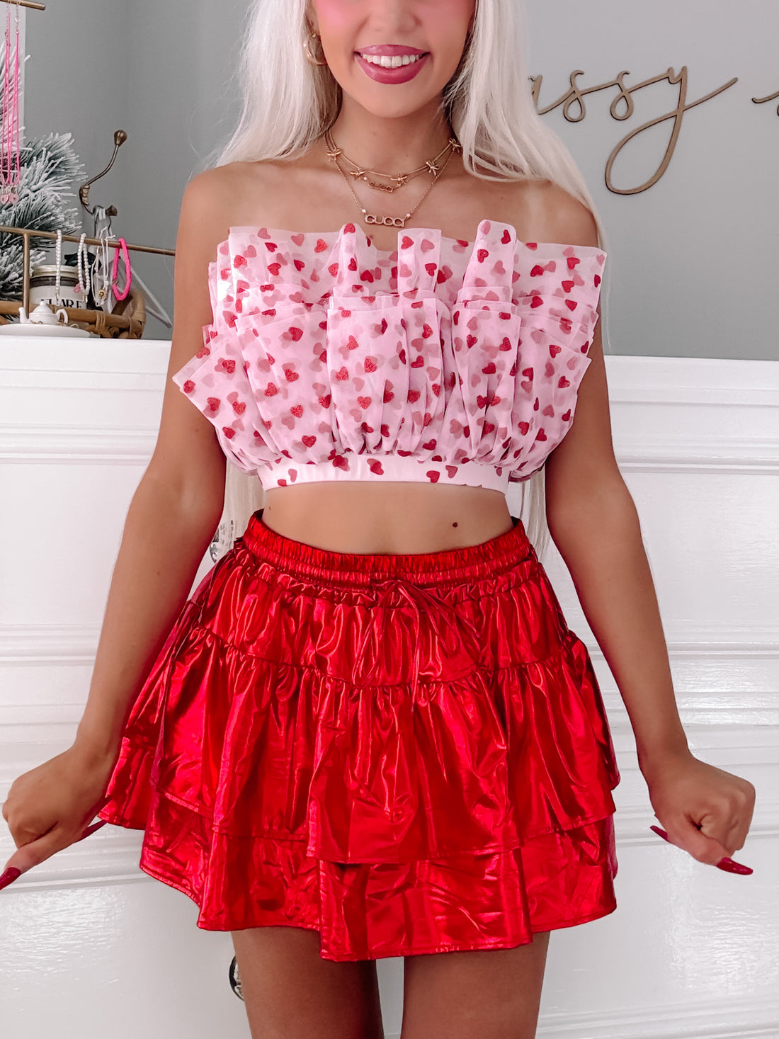 Red shimmery tiered mini skirt; flirty, fun skirt.
