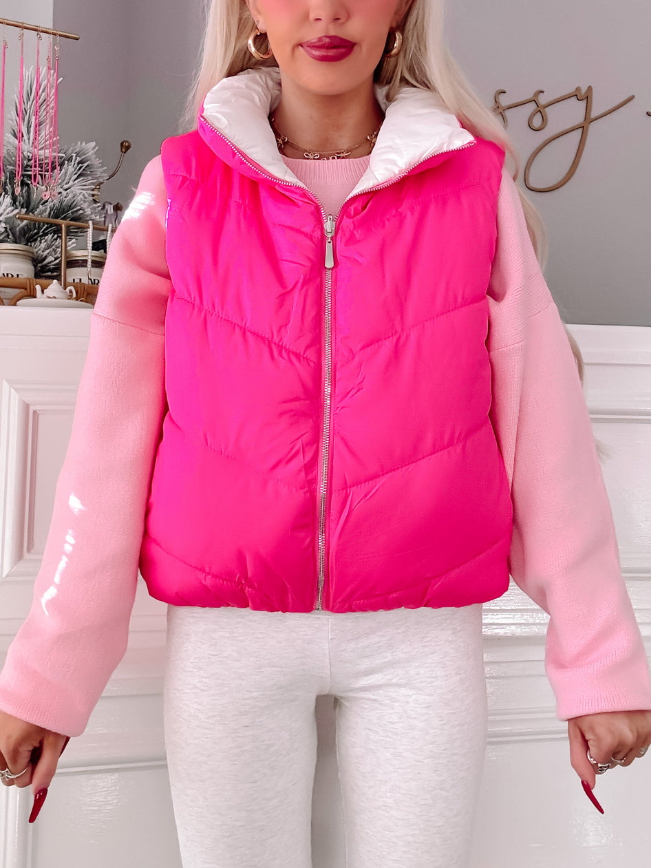 Turnabout Pink Puffer Vest: bright pink quilted puffer vest with white inner collar
