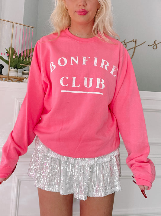 Pink Bonfire Club crewneck sweatshirt with white logo
