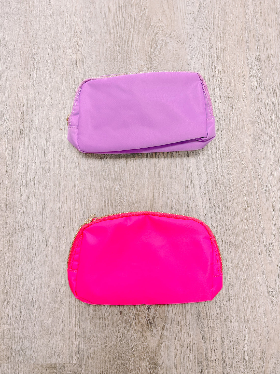 Bubblegum Bomb Belt Bag: Lavender & Hot Pink nylon zipper pouches.
