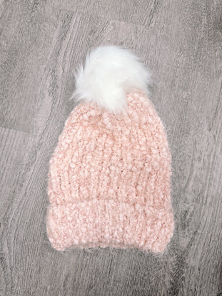 PFS Beanie #1: Pink fuzzy beanie with white pompom, perfect for winter warmth.
