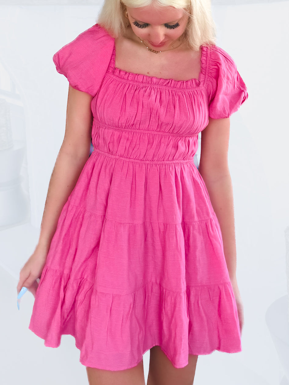 Nora pink tiered mini dress with puff sleeves

