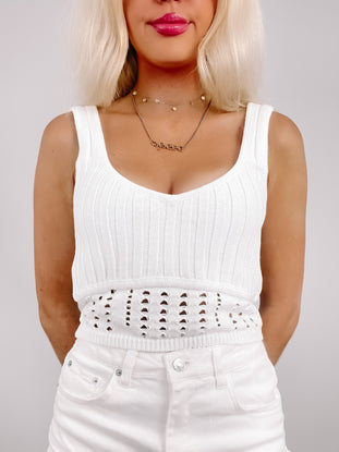 White Crochet Kisses ribbed knit crop tank top with crochet detailing.
