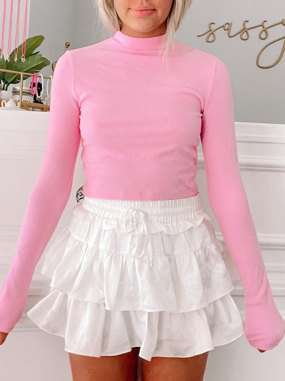 Pink Pleaser long sleeve ribbed crop top & white ruffle mini skirt
