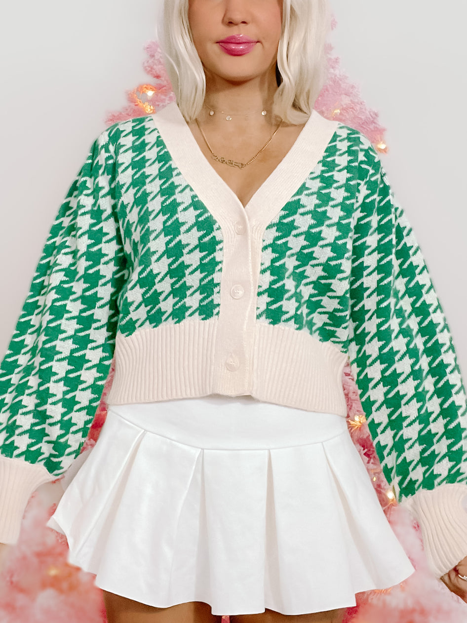 Ellison Green Houndstooth Cardigan: Cropped green and cream houndstooth knit cardigan with button front.
