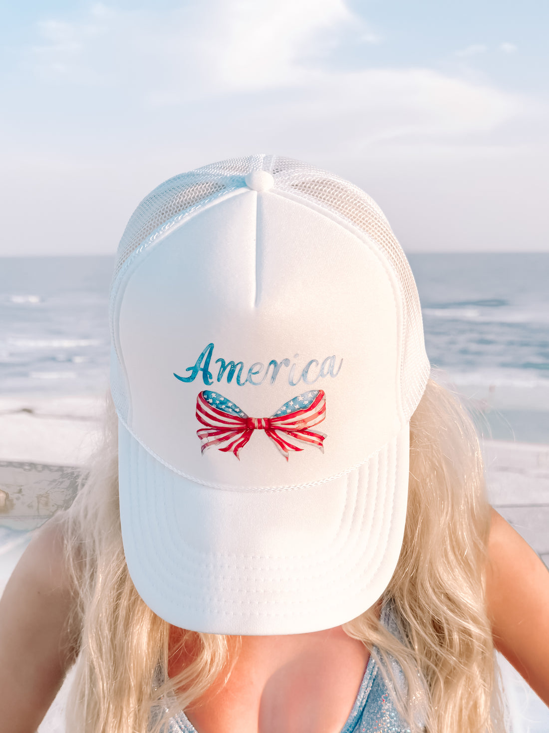 White America Bow trucker hat with USA flag bow design
