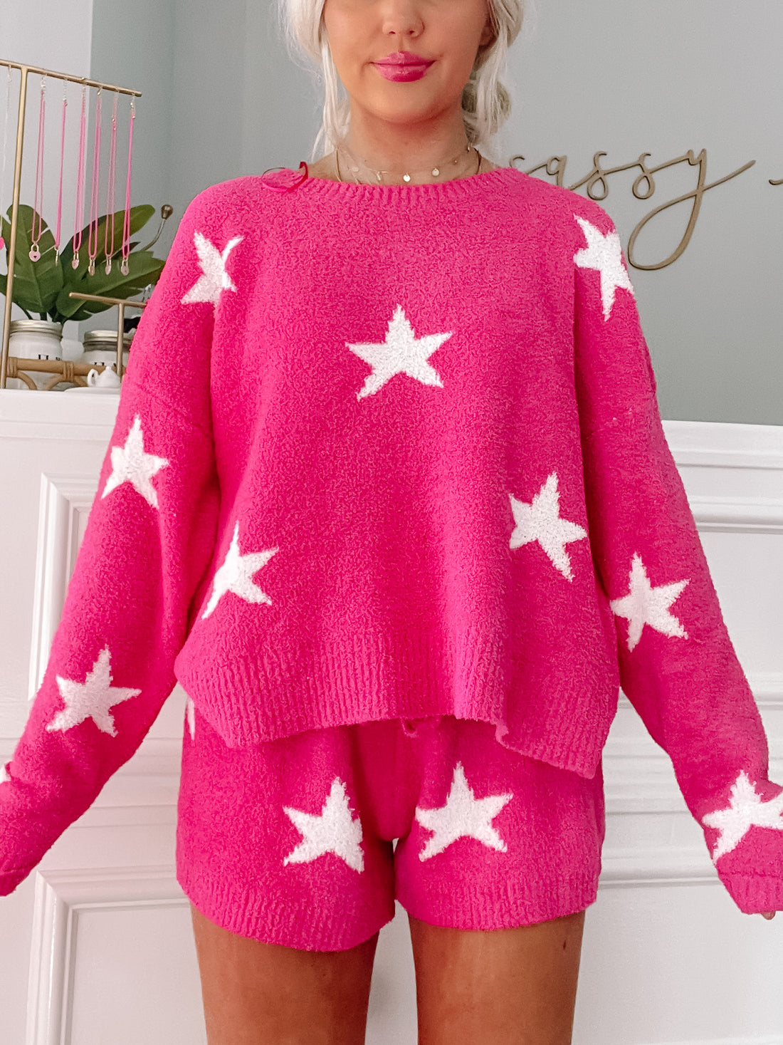 Hot pink Cuddle in the Clouds star-print sweater and shorts pajama set.
